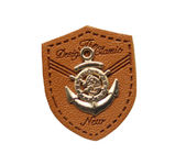 custom leather labels for hats garment leather tags wholesale with metal logo