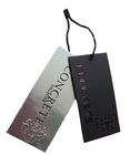 custom garment paper tag with seal tag embossed silver stamping logo for T-shirt