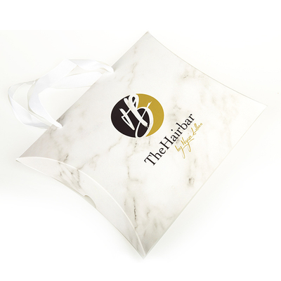 Custom Printed Paper Pillow Boxes With Handle Rope – Luxury Gift Packaging With Silver Foil Logo