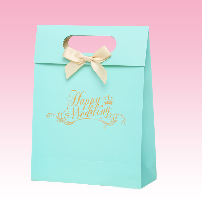 custom promotional paper carry bag for gift with die-cutting handle manufacturer