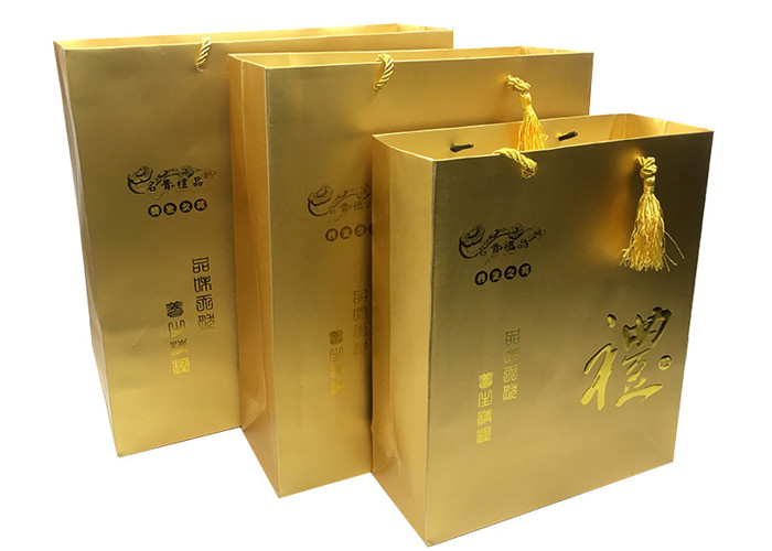 Custom Printed Luxury Gold Paper Gift Bags Packaging with Embossed LOGO for Sale